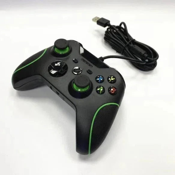 Wired black gaming controller with green accents and USB connector on white background